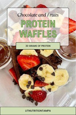 Chocolate protein waffles with strawberries, bananas, and chocolate chips.