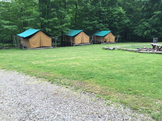 One of the typical Tent Campgrounds. Very large, tall, heavy canvas tents w/comfortable spring cots & mattresses inside.