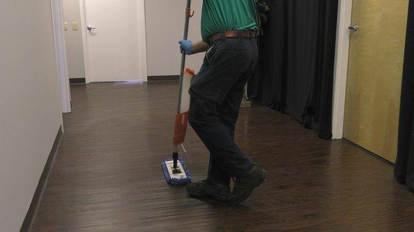 Business cleaning companies - mopping with microfiber mops