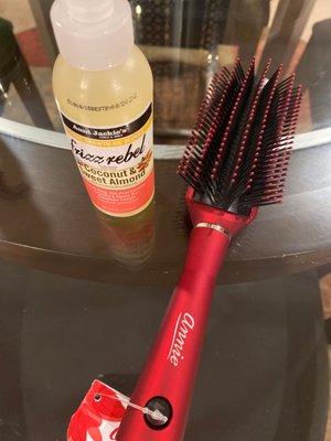 Detangling brush and almond oil.