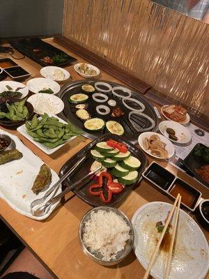 Shrimp, jidori chicken, Edamame, vegetable Gyoza, assorted vegetables, white rice