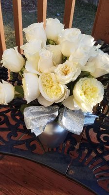 White roses with ribbon that I made.