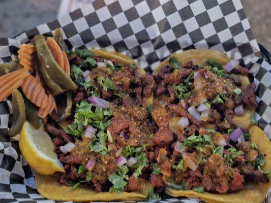 Tacos El pastor...loaded with meat, great seasoning, freshly fried tortillas.