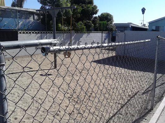 am I the only one that wonders why you put a chain link fence around a children's play area to start with?