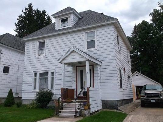 Nice family home w/side hall entryway and open staircase.  French doors open to living room, natural wood archways to dining ...