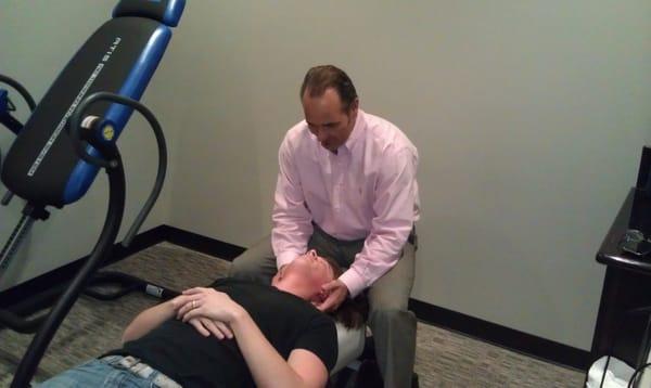 Dr. Scribner working with a patient