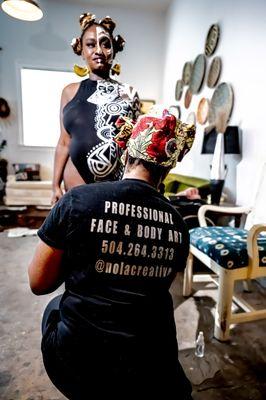 Beautiful Mother to be  Ashley Hamilton and Summer Carter of NOLA Creative captured by photographer Jafar Pierre 
 body paint , face paint ,