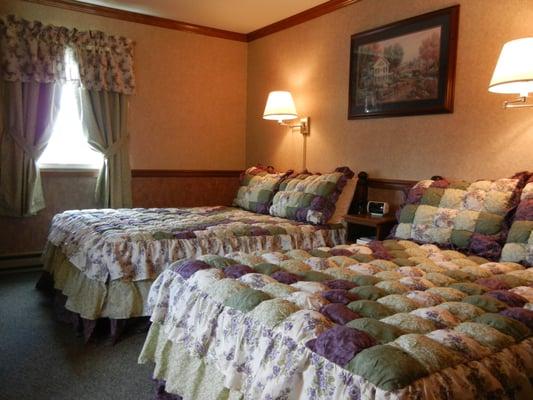 Puff quilted queen and double beds with view of Amish farm