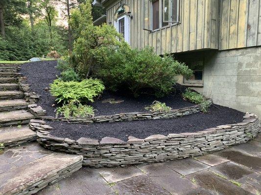 A recent project we completed. Mulch can really make a plant bed pop!