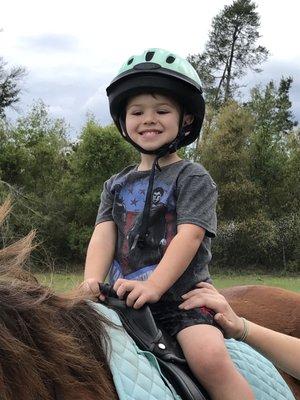 This smile says it all!!  Javi's first ride!!