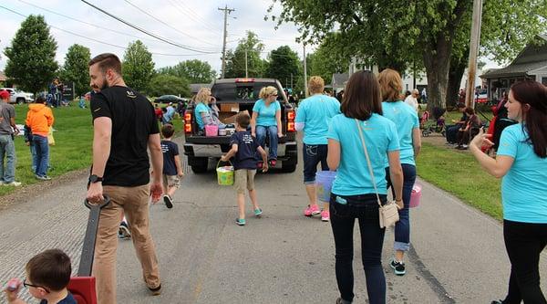 Titus family and staff toss dental floss in the annual Middletown parade.