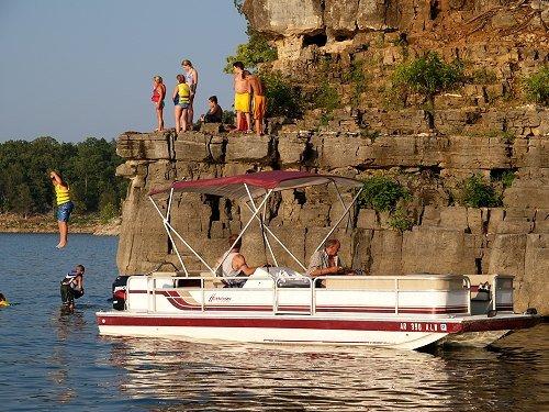 Pontoon and deck boats available to rent with cabin rental