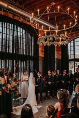 Floral Chandelier and Broken Arch Designed