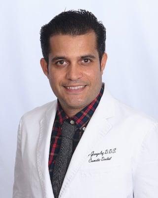 Dr. Edek Gonzalez DDS
 Cosmetic Dentist & Dental Implant