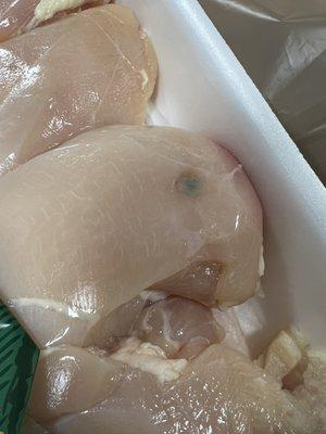 "Fresher than Fresh" chicken I just bought. Couldn't see that wonderful little spot because the label covered it up.