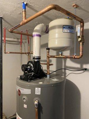 Power vent water heater installation