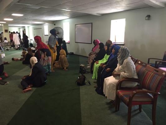 Seats for the older women so they can pray comfortably.