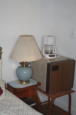 My room came with with a fridge and a coffee pot. Filters, mugs, and coffee were nowhere to be found though.