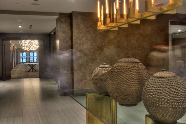 Custom Earth-tone Marmorino Venetian Plaster with metallic wax surface design on Autograph Hotel Lobby, Worcester, MA