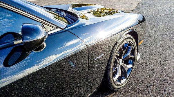 Insane gloss on this Challenger thanks to our polishing.