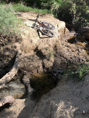 The trail is washed away at the end of Las Llajas... water is still flowing.