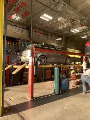 My vehicle on the lift before getting worked on