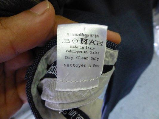 Instructions were clear: dry clean. How could they not know that you don't put suits in the washer/dryer?