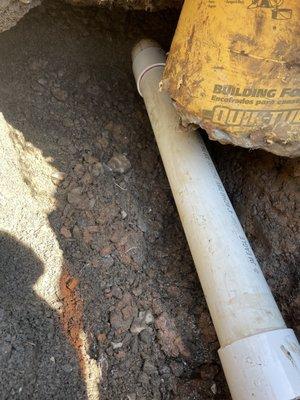 Repaired drain line 4' underground that was fixed after being drilled through when someone installed the patio.