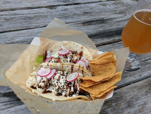 Blackened Ahi tuna tacos. With some chips and salsa, and paired with a fun beer from Fly Trap.