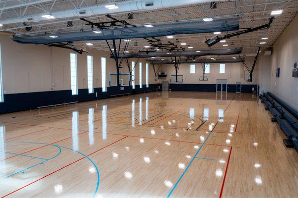 The south gym has hardwood floors that can be used for basketball or volleyball.