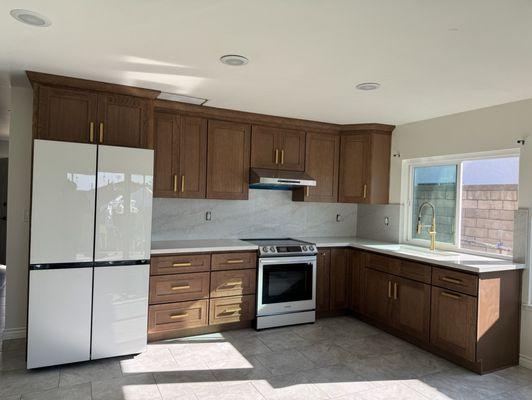 I installed the mocha colored cabinet's they have a nice lux feel to them and no chemical smell, just natural wood smell.