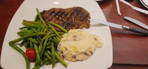 Ribeye perfectly cooked lacked seasoning, I used A1, which did the job.  Mashed potatoes very good