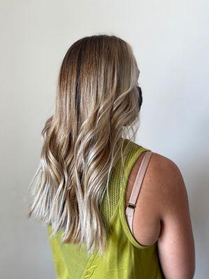 Ashy platinum balayage performed by Devon