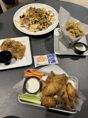 Wings.  Nachos. Fried pickles. Chicken pot stickers.