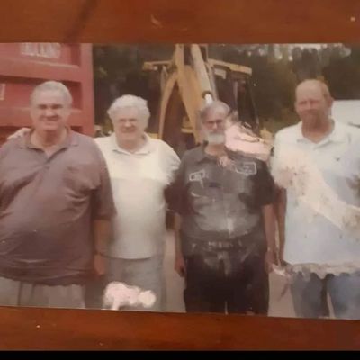 The family business my uncle Tug in purple my uncle Robert in white dad in the Briggs steel workers uniform and my cousin