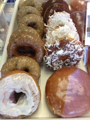 Coconut donut, jelly donut, blueberry donut, vanilla icing donut...