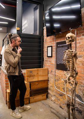 As the journey begins at The Bone Museum, a guest is greeted by the enigmatic allure of the first exhibit