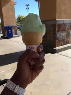 A scoop of pistachio ice cream