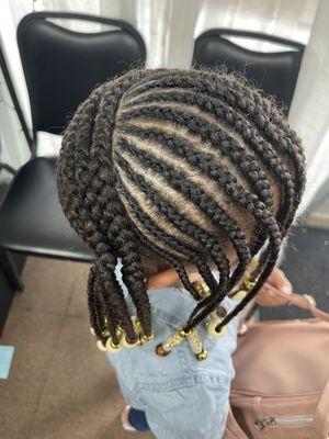 Side view of lemonade braids.