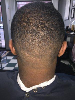 Low top Bald fade hair cut.