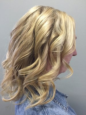 Natural hair that is Hi-lighted and curled