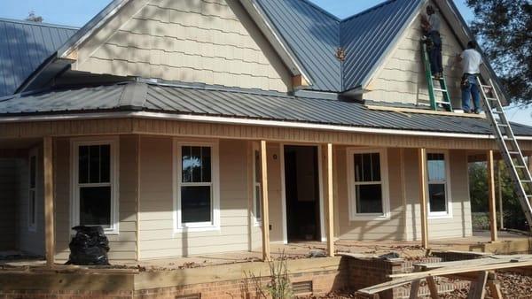 Roof is Complete. Finishing the installation of siding.