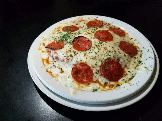 Hand pounded and breaded tenderloin, covered in Pizza sauce, toppings and cheese, then baked in our brick Pizza oven.