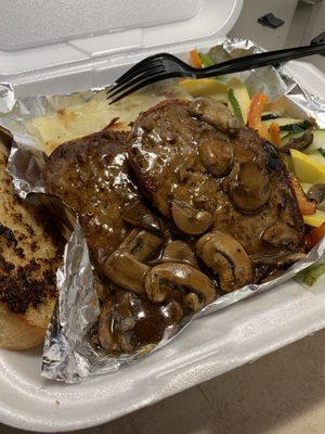 Bacon wrapped meatloaf with mushroom gravy, scalloped potatoes and grilled vegies (with garlic bread-extra)