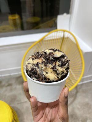 Single scoop split of Butterscotch Fudge Brownie and Salted Dark Chocolate Oreos