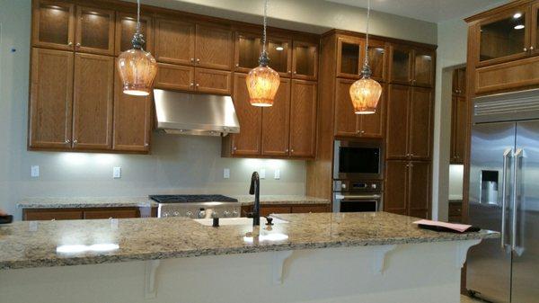 My island pendants, beautiful warm tones. Desiree, at Manteca Lighting is such a gem!