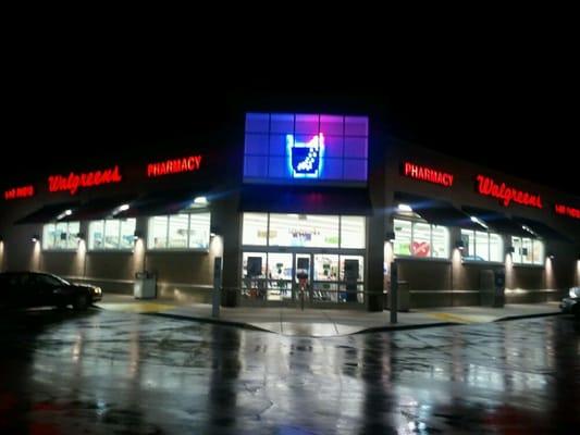 The front of the store at night.