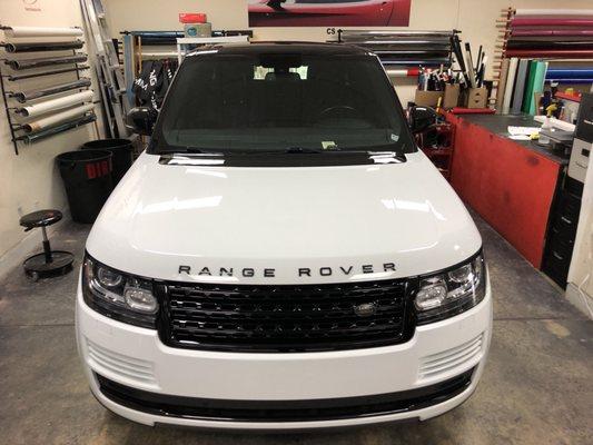 Blacked out grill, top panel piece, lettering and front bottom fender piece. And also wrapped the side mirrors.