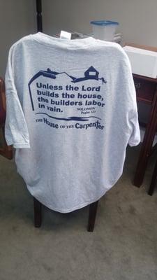 House of Carpenter T shirt back side. Gray with navy blue. Shirts N More has a lot of options.