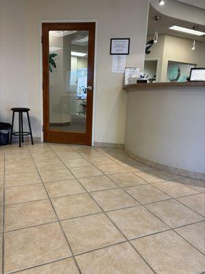 Front desk and door to treatment area.